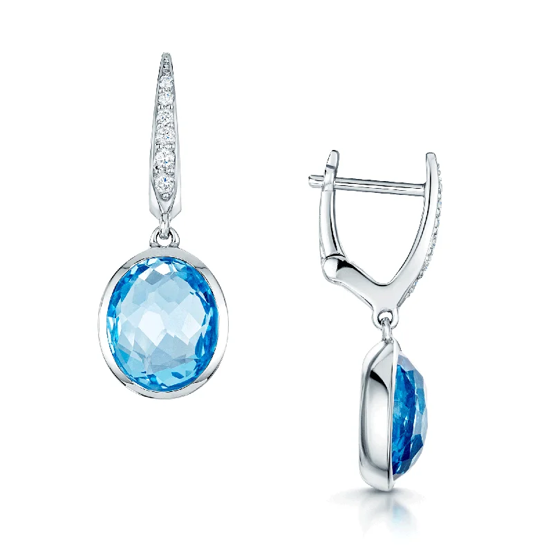 elegant earrings for women-18ct White Gold Oval Blue Topaz And Diamond Drop Earrings